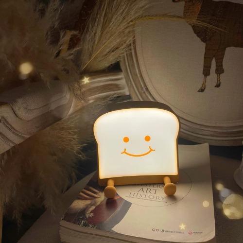 QANYI Toast Bread Night Light ,Soft LED Toast Lamp with Cute Face Always Smile,Bedroom Table Lamps Graduation Gifts Ideas for Teen Girls 10 11 12 13 14 Year Old Girls / Toast Sleeping