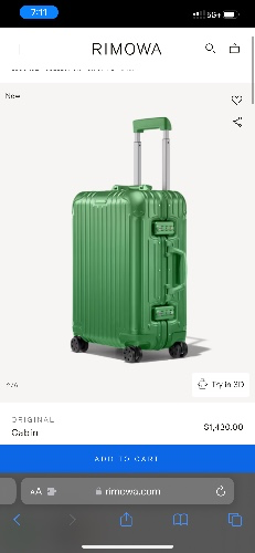 Green Rimowa suitcase