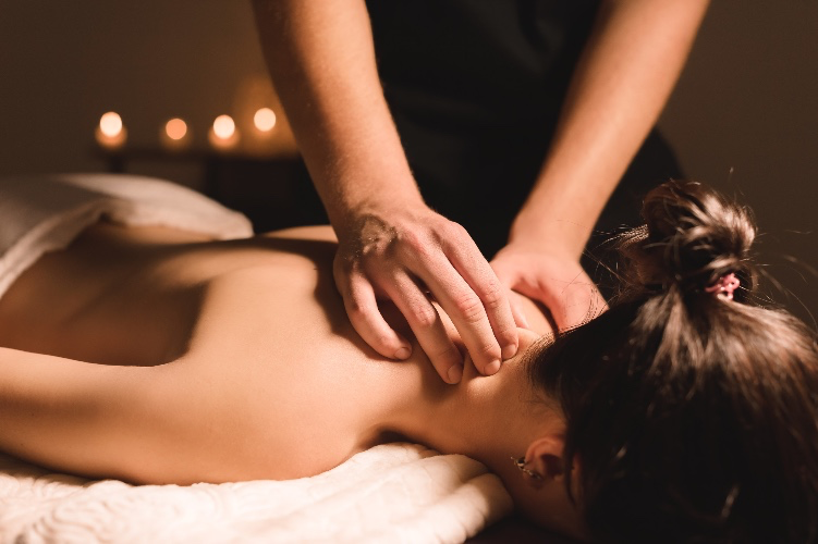 By weekly massage 