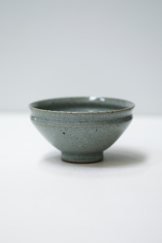 Small bowl, indented rim, pale green crackle glaze (12) — florian gadsby