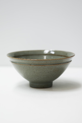 Large curved bowl, indented rim, dark green crackled glaze (13) — florian gadsby