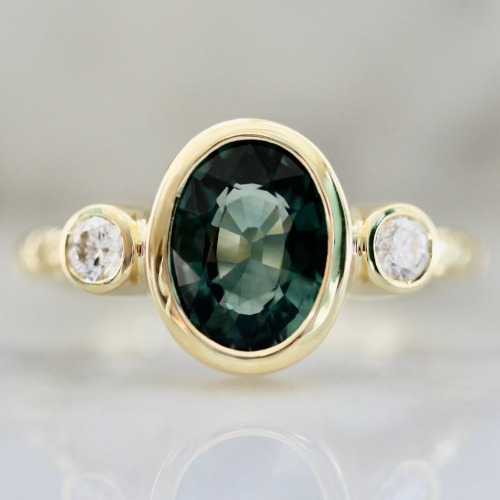 Lucky Charm Green Oval Cut Sapphire Ring | 7