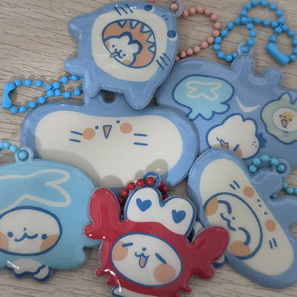 seafoam poofy charms
