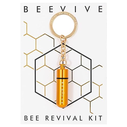 The Original Bee Revival Kit with Bee ID tag - Gold keyring containing a bee food syrup to help a tired bee. Bee-friendly gift for nature lover