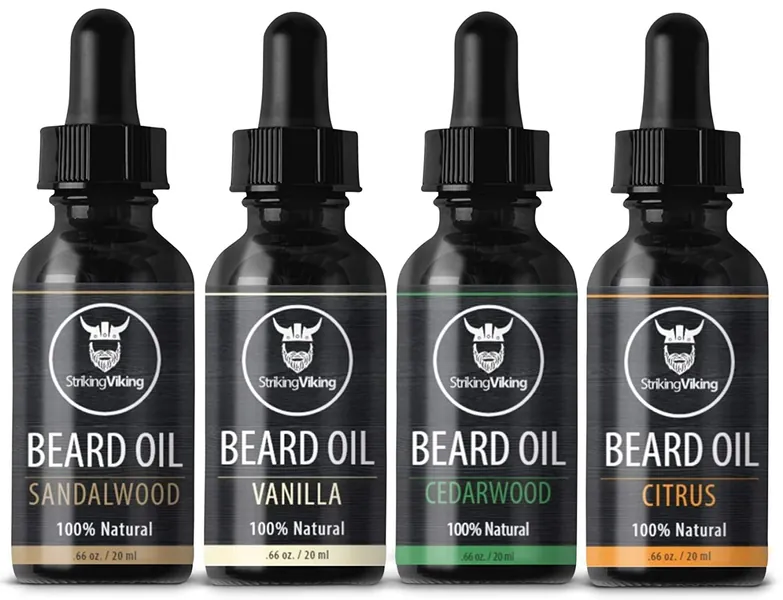 Scented Beard Oil Variety Pack of 4 - Natural Citrus, Vanilla, Sandalwood, & Cedarwood Sampler Scents for Men - Softens & Conditions with Organic Tea Tree, Argan, & Jojoba Oils - Striking Viking - Sandalwood, Vanilla, Cedarwood, Citrus 0.66 Ounce (Pack of 1)