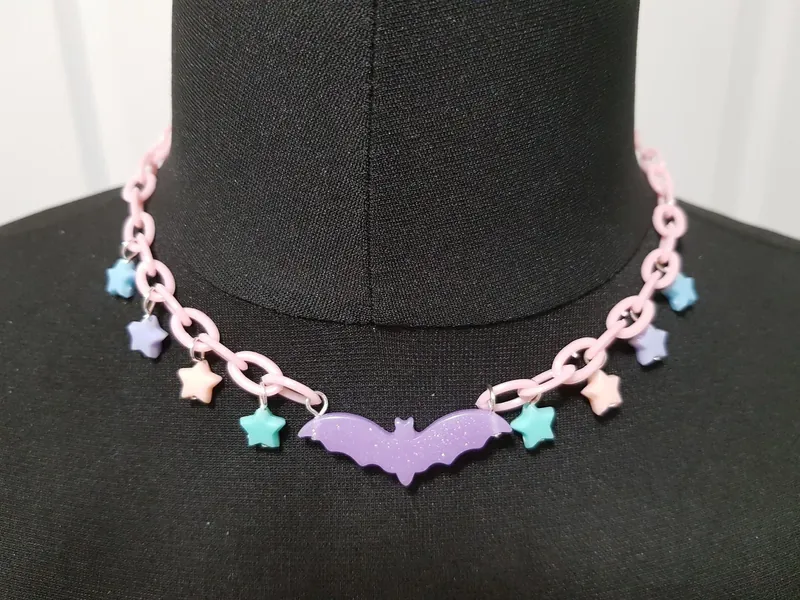 Pink and multicolour pastel necklace with stars and bats. Pastel goth fairy kei lolita super cute