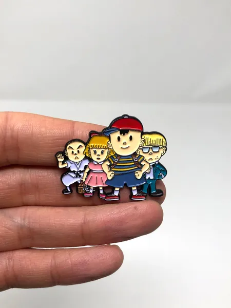 EarthBound for SNES - Ness, Paula, Jeff and Poo enamel pin or magnet - Classic SNES retro gaming art