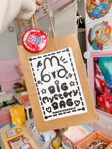 Mystery Grab Bags (Includes a mix of 5 print and/or bookmarks and/or sun catchers and/or vinyl Stickers) Oopsie and Regular Bag
