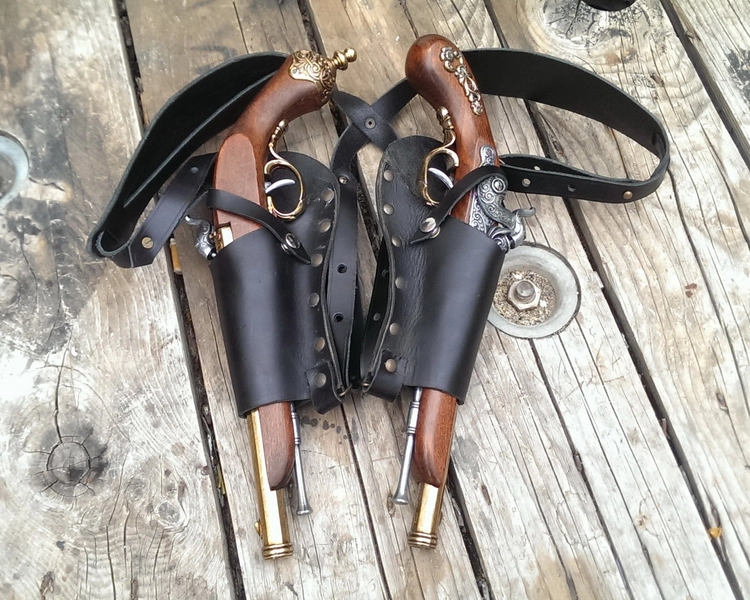 Leather Shoulder holster for two guns. Shoulder harness for carrying two guns concealed.