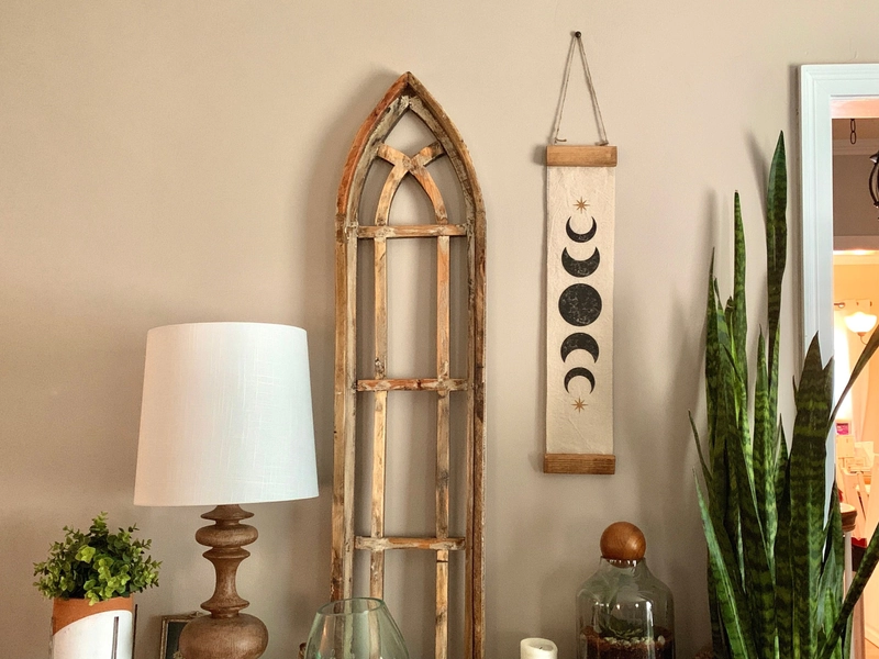 Black Moon Phase Banner with Gold Starburst 