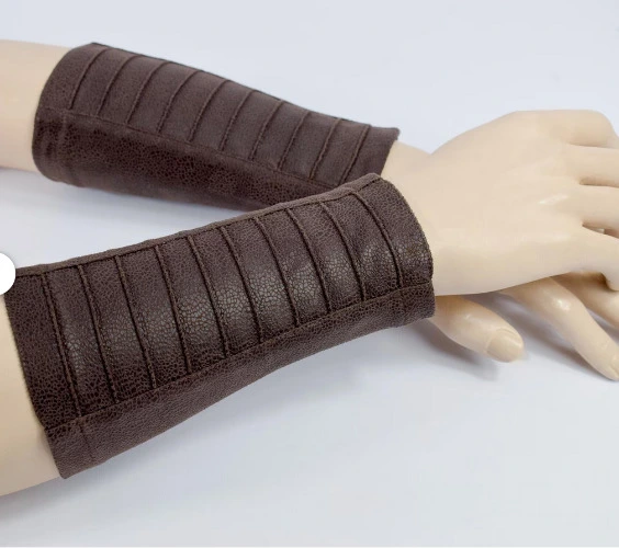 Brown leather bracers