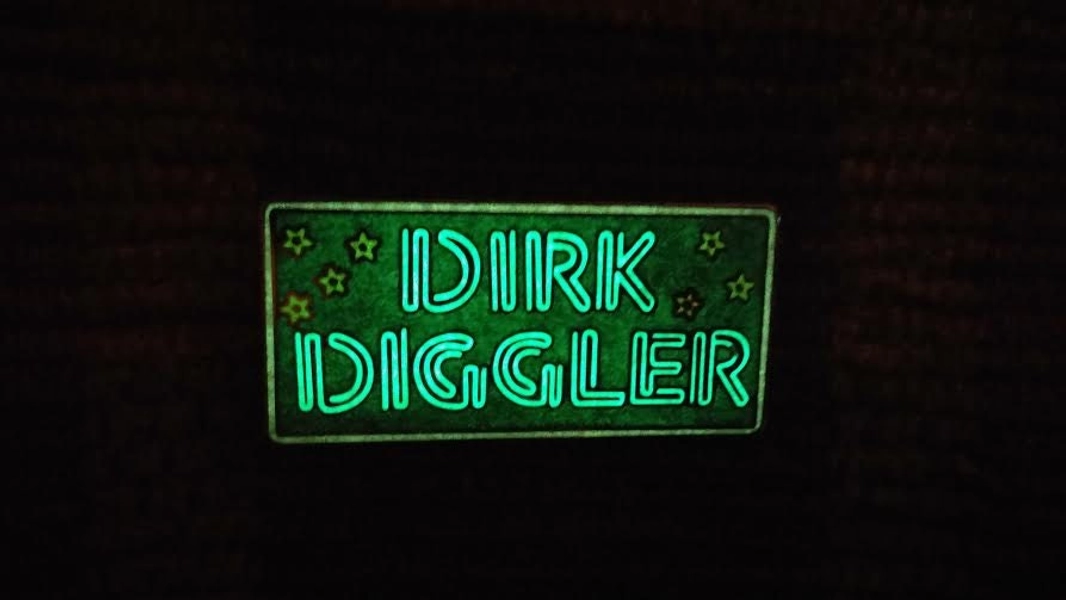 Glow in the Dark Dirk Diggler Neon Sign Enamel Lapel Hat Pin