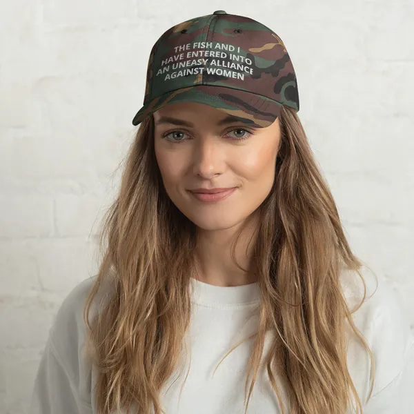 The fish and I have entered an uneasy alliance against women - Unisex Hat