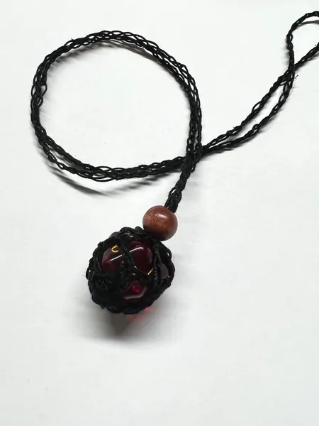 Dice holding necklace