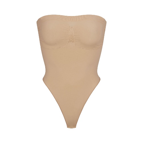 SEAMLESS SCULPT STRAPLESS THONG BODYSUIT | CLAY | XXS