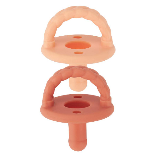 Itzy Ritzy Sweetie Soother Pacifier Set of 2 - Silicone Newborn Pacifiers with Collapsible Handle & Two Air Holes for Added Safety; Set of 2 in Apricot & Terracotta, Ages Newborn & Up