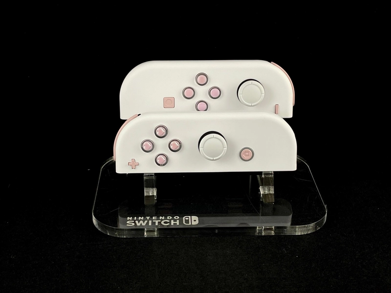 White Nintendo Joycons with Pink Pastel Heart buttons