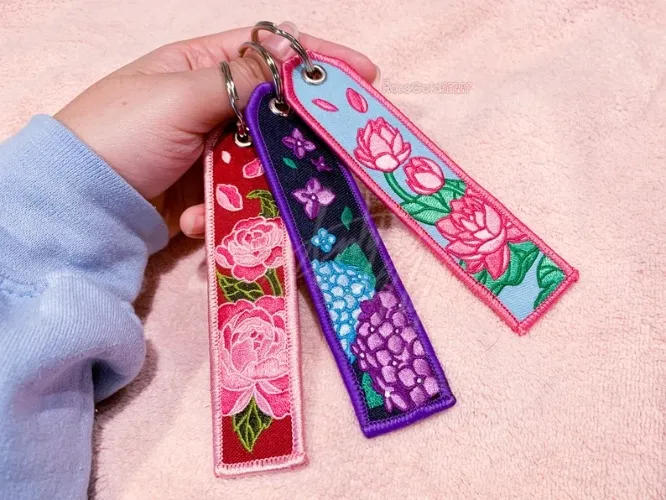 Peony, Hydrangea, Lotus Flower Themed Embroidered Jet Tag Keychain (1.25 x 5 inches)