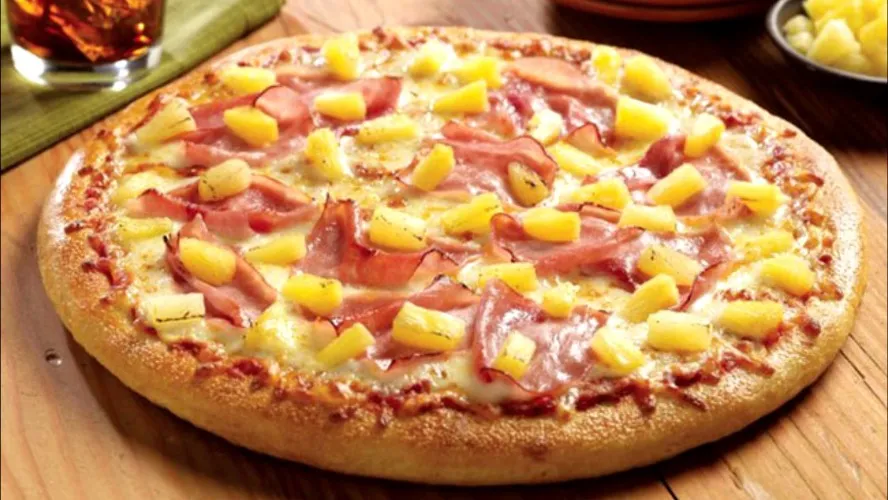 Probar pizza con piña 🍍