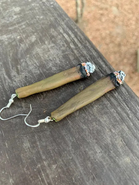 Palm leaf blunt with a cherry on top marijuana stoner cannabis game swisher backwoods ganja sweetchibababy