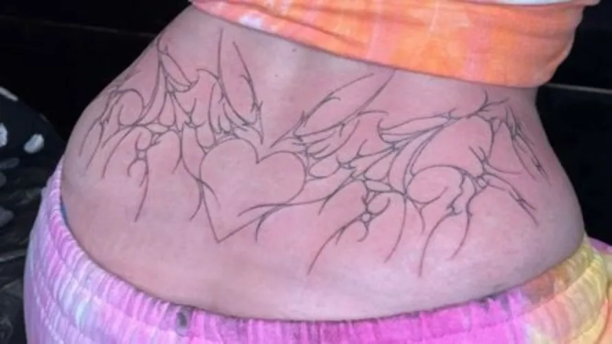 Lower back tattoo