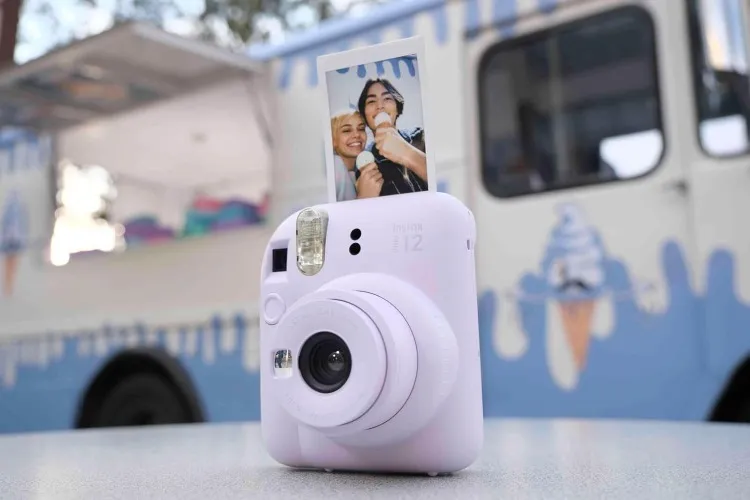 FUJIFILM INSTAX Mini 12 Instant Film Camera | Lilac Purple Bundled with INSTAX Mini Instant Film |40 Exposures + Instax Accessory Bundle + AA Batteries + Cleaning Cloth (10 Items) - Lilac Purple