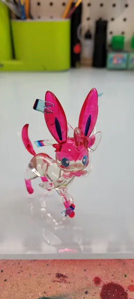 Sylveon figurine from Pokemon, a custom figurine, 3D printed in clear resin and hand painted figurine.