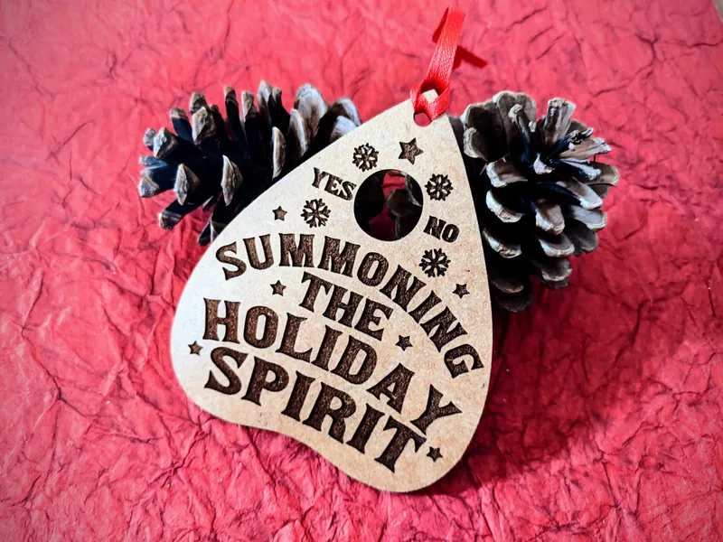 Summoning the holiday spirits wooden planchette Christmas ornament. Ouija. Yule ornaments. Horror Christmas. Christmas ghosts
