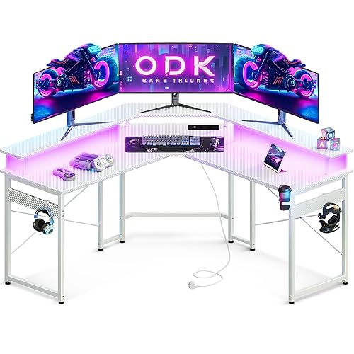 ODK Gaming Tisch mit LED, Gaming Schreibtisch mit 2 Steckdosen und 2 USB Ladeanschluss, PC Tisch Gaming mit großzügiger Monitorablage, Gamer Schreibtisch in Kohlefaser Weiß, 129x129 cm - Kohlefaser Weiß