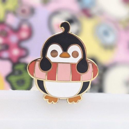 Penguin at the Beach "Rubber Ring" Enamel Pin