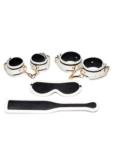 Kink In The Dark Glowing Cuffs, Blindfold And Paddle Set | Babeland Toy Store