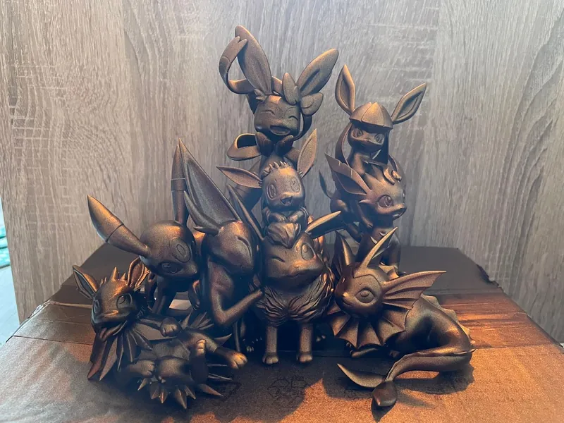 Eevee en Eevolutions Statue - Handgemaakt Pokemon Decor - Grijze of gouden versie