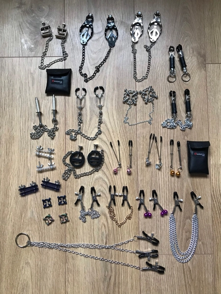 Nipple clamps UK many styles for submissive men and women. Clover clamp, circle, tweaser, beginner BDSM nipple pinch fetish play. Clit clip.