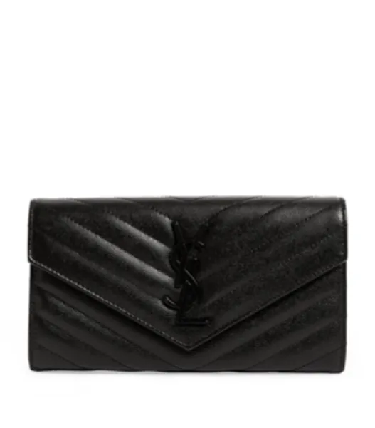 Saint Laurent black Monogram Saint Laurent Matelassé Large Flap Wallet | Harrods UK