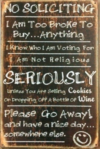 No Soliciting tin metal sign
